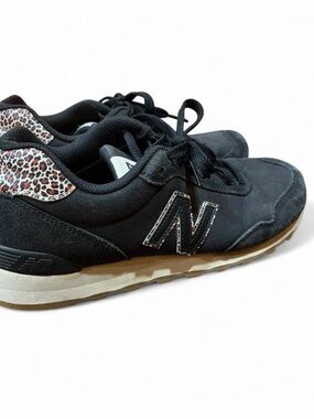 New Balance Women's Black Athletic Sneakers with Leopard Heel Accent